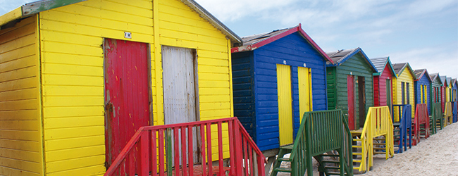 LISA-Sprachreisen-Englisch-Kapstadt-Strand-bunte-Haeuser-Meer-Kap-der-guten-Hoffnung