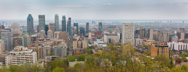 LISA-Sprachreisen-Erwachsene-Englisch-Franzoesisch-Kanada-Montreal-Skyline-Hochhaeuser-Parks